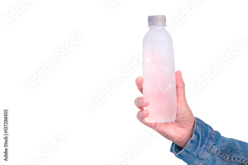 Business women hand holding Bottled water . isolated on white background , Clipping Path