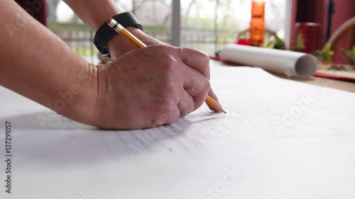 Hands Over Building Plans
