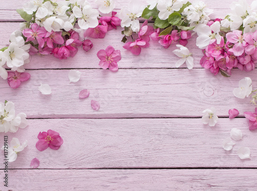 apple flowers on wooden background