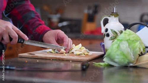 Man Cutting Boiled Eggs