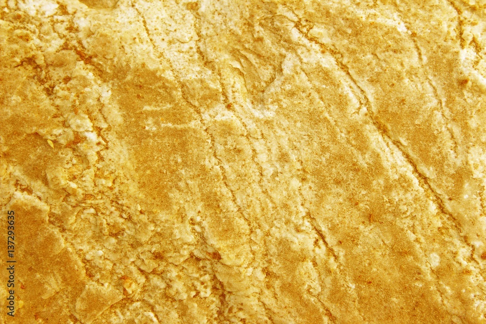 surface of the marble with gold tint / can be used for background or wallpaper