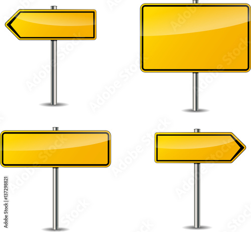 four yellow blank signs