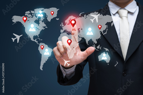 Businessman touch on screen for world business travel transport. Businessman traveling concept