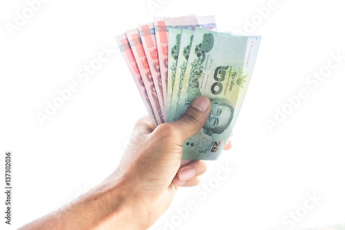 Hand with money isolated on a white background