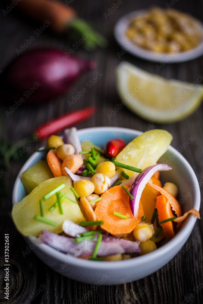 Vegetable Salad with Chickpea on Dark Background Vegetable Salad with Chickpea on Dark Background