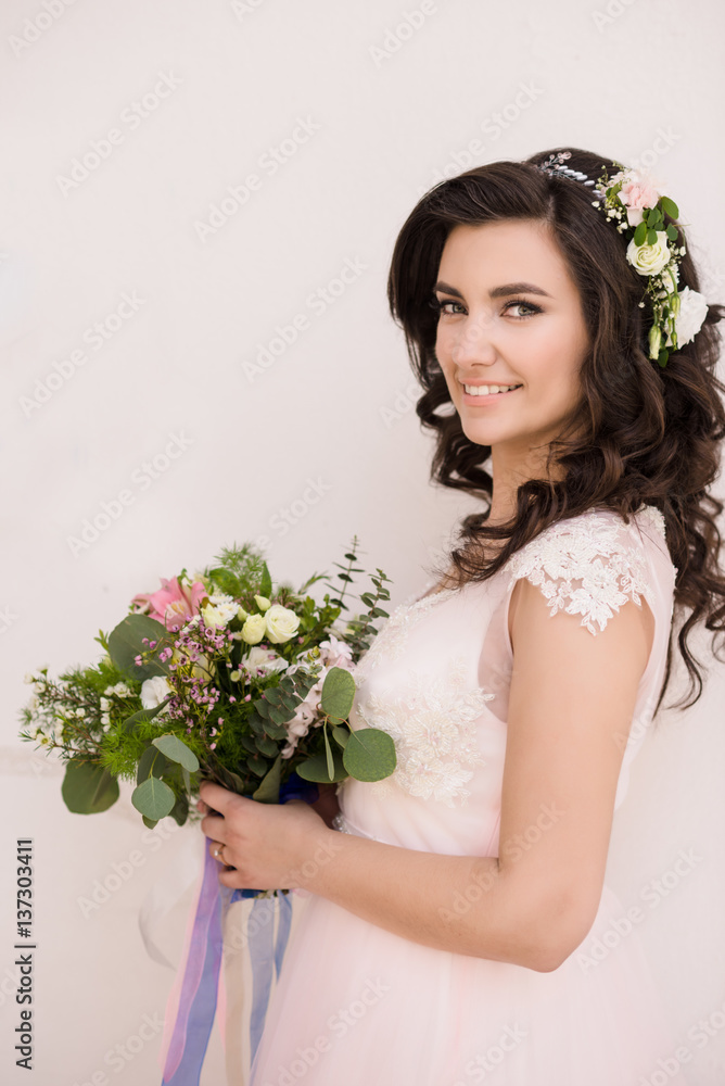 pretty bride in wreath outdoor