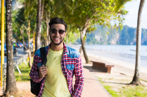 Young Hispanic Man Walking Tropical Beach Sea Holiday Guy Happy Smiling Summer Vacation Ocean Travel