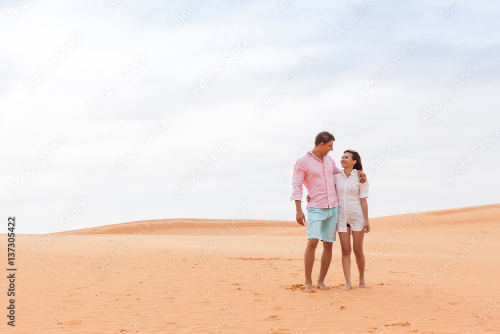 Young Man Woman In Desert Beautiful Couple Asian Girl And Guy Embrace Sand Dune Landscape Background