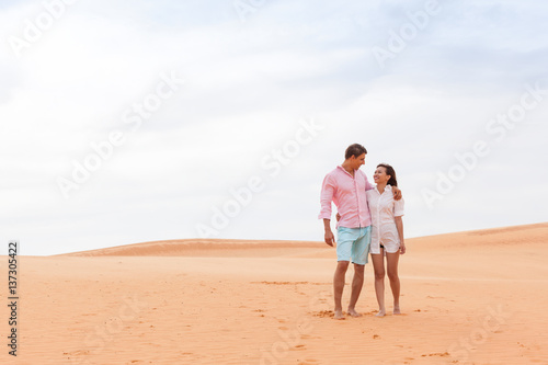 Young Man Woman In Desert Beautiful Couple Asian Girl And Guy Embrace Sand Dune Landscape Background