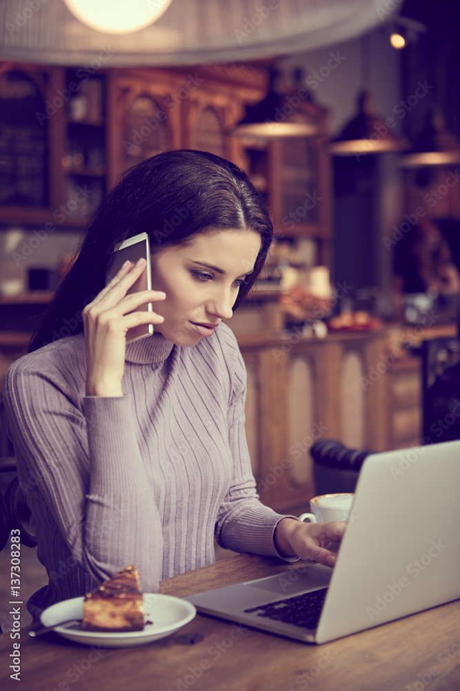 woman working with laptop in cafe. social network concept woman working with laptop in cafe. social network concept