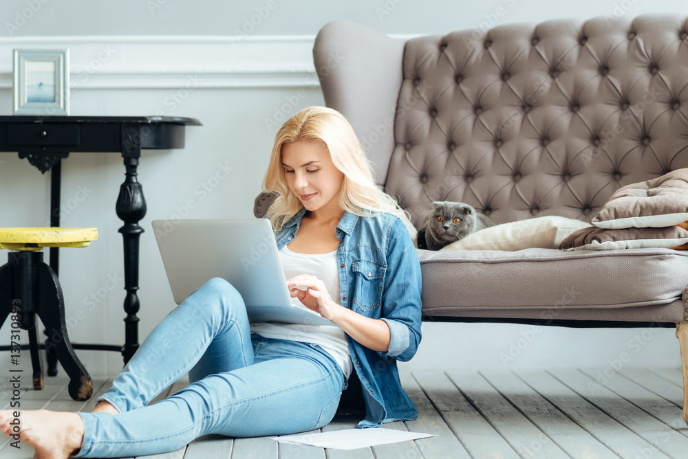 Hardworking woman using laptop at home Hardworking woman using laptop at home