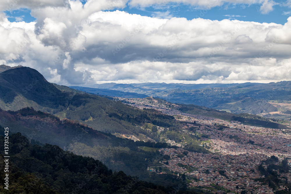 The suburbs of Bogota rise up into the mountains near the Candelaria Neighborhood.