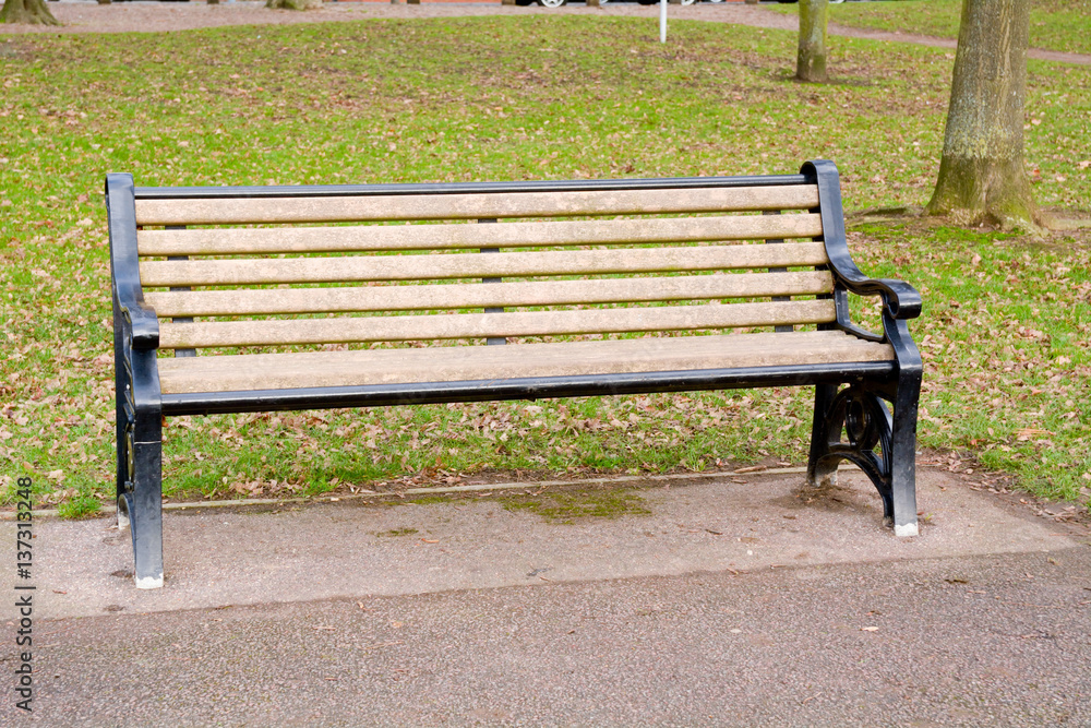 Park bench with metal frame and recycled plastic seat