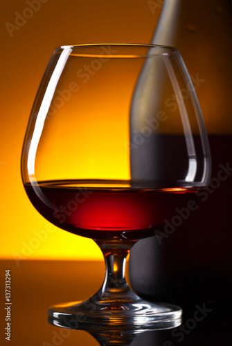  bottle and glass of brandy