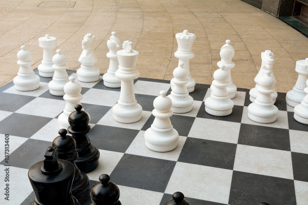 Large plastic chess set in shopping centre - for public to play