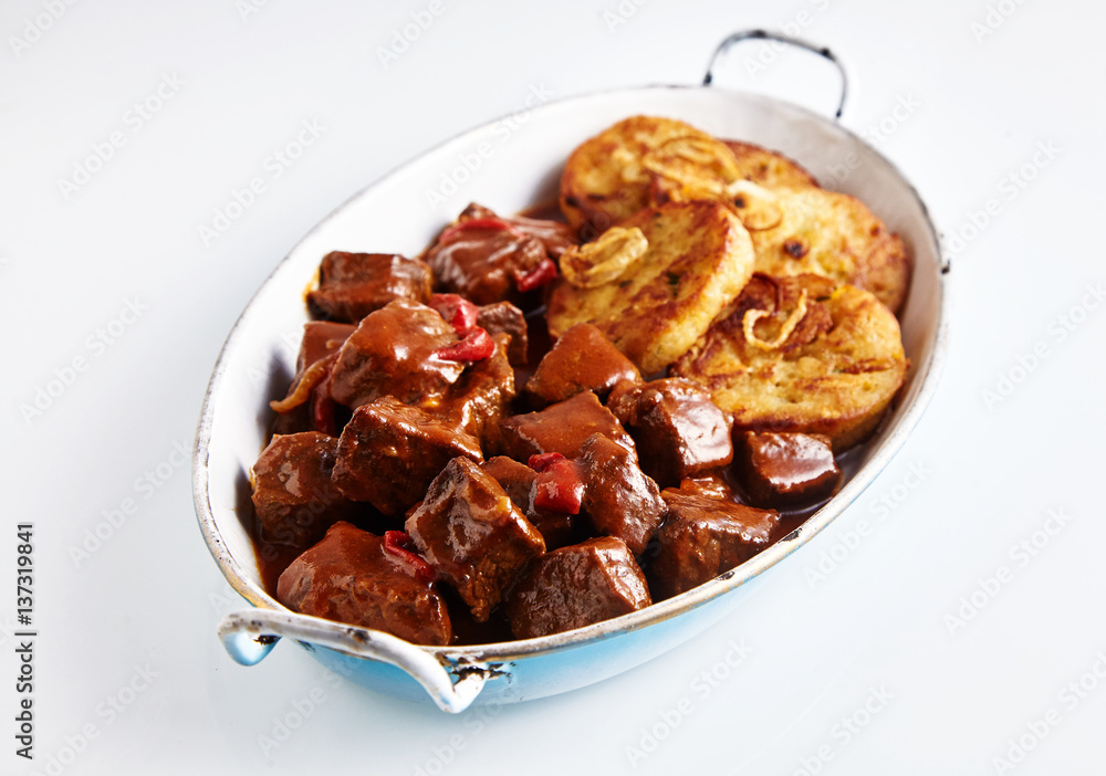 Serviettenknodel bread dumplings with goulash Serviettenknodel bread dumplings with goulash