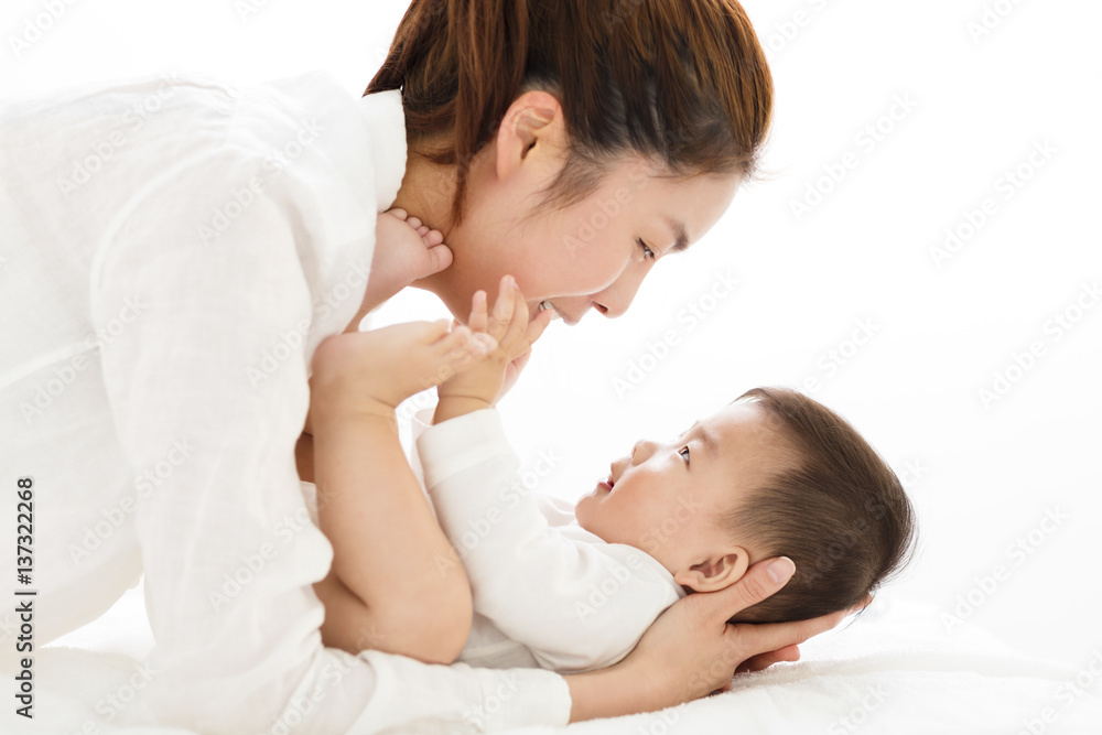 young asian Mother holding sweet baby boy young asian Mother holding sweet baby boy