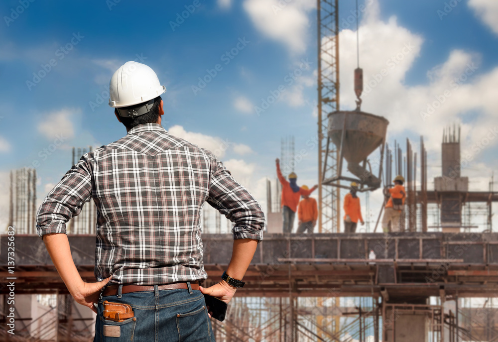 Work Safety officer or Civil Engineer. team worker on background of construction site Work Safety officer or Civil Engineer. team worker on background of construction site