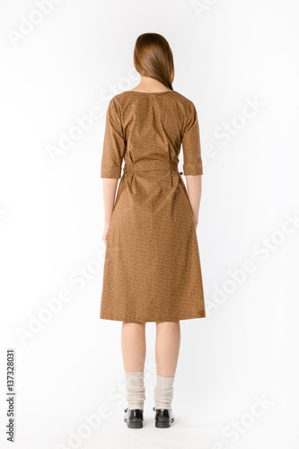 Details of women's clothing. Detail dress on a model on a white background