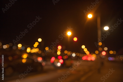 De focused/Blurred image of night city. Vehicles on the road. © justinessy