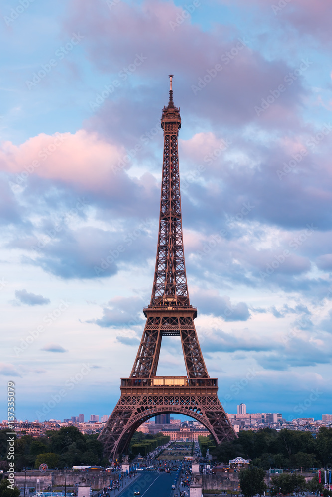 Eiffel Tower in colors of pink twilight Paris