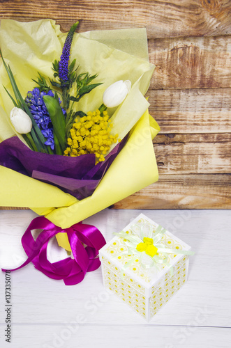 Fototapeta Naklejka Na Ścianę i Meble -  beautiful bouquet in yellow and purple packaging