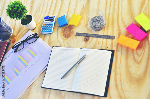 Wallpaper Mural Top view business stuff with sale report , glasses, notebook Torontodigital.ca