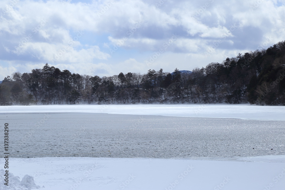 Winter's Lake Yunoko in Nikko city, Tochigi, Japan / Lake Yuno-ko is known one of the beautiful winter spots in Nikko or Oku-Nikko Winter's Lake Yunoko in Nikko city, Tochigi, Japan / Lake Yuno-ko is known one of the beautiful winter spots in Nikko or Oku-Nikko