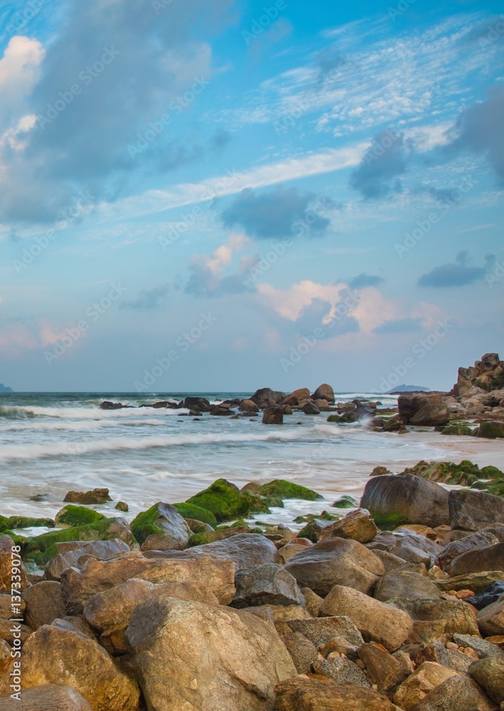 A rocky ocean coastline over the south China sea in Vung Lam Bay Vietnam.