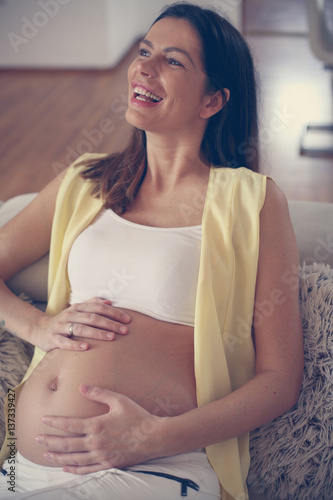 Pregnant woman at home. Free Download Pregnant woman at home. - GFXLoad