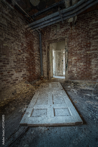 Fallen door in an abandoned building