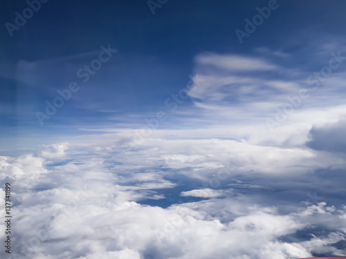 Sky and White cloud From inside the plane