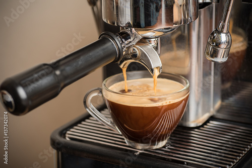 Coffee machine making espresso coffee