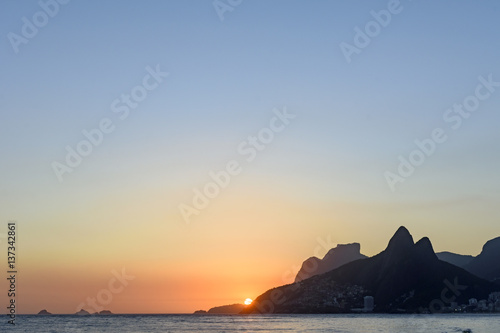 Summer sunset at Ipanema beach in Rio de Janeiro photo
