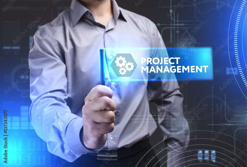 Business, Technology, Internet and network concept. Young businessman showing a word in a virtual tablet of the future: Project management Business, Technology, Internet and network concept. Young businessman showing a word in a virtual tablet of the future: Project management
