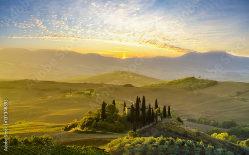 Tuscan autumn landscape in the light of the rising sun