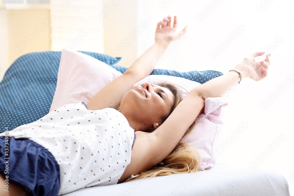 Happy woman stretching in the morning Happy woman stretching in the morning