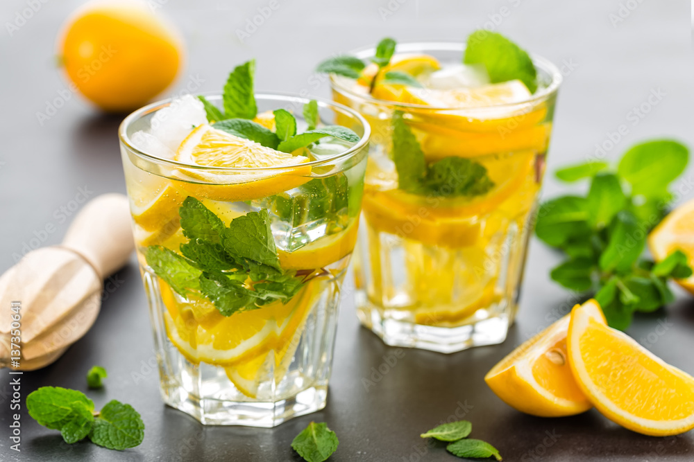 Lemon mojito cocktail with mint, cold refreshing drink or beverage Lemon mojito cocktail with mint, cold refreshing drink or beverage