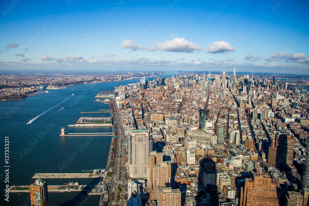Skyline aerial view of Manhattan with skyscrapers and Hudson River - New York, USA