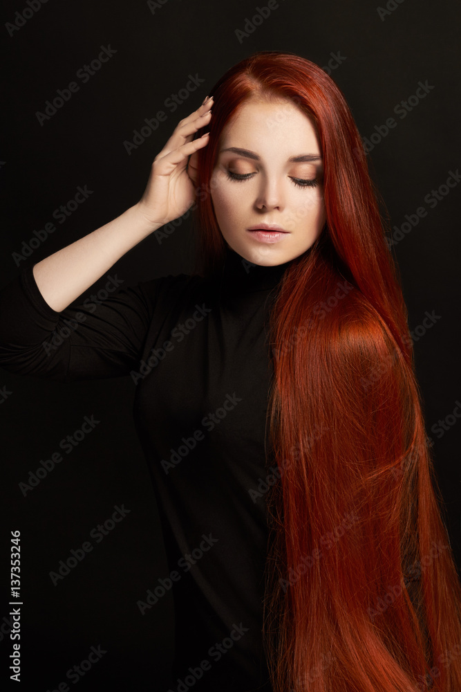 Sexy beautiful redhead girl with long hair in dress cotton retro. Woman portrait on black background. Deep eyes. Natural beauty, clean skin, facial care and hair. Strong and thick hair. Flower Sexy beautiful redhead girl with long hair in dress cotton retro. Woman portrait on black background. Deep eyes. Natural beauty, clean skin, facial care and hair. Strong and thick hair. Flower