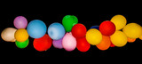 Multicolored balloons on black background