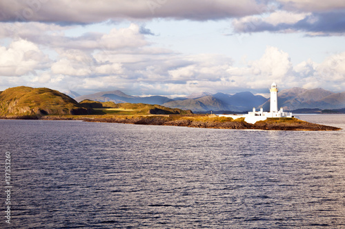 The Eilean Musdile Lighthouse between Oban and Isle of Mull photo