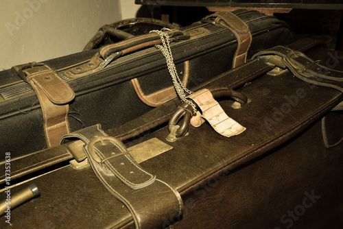 Old dusty suitcases. Vintage baggage.