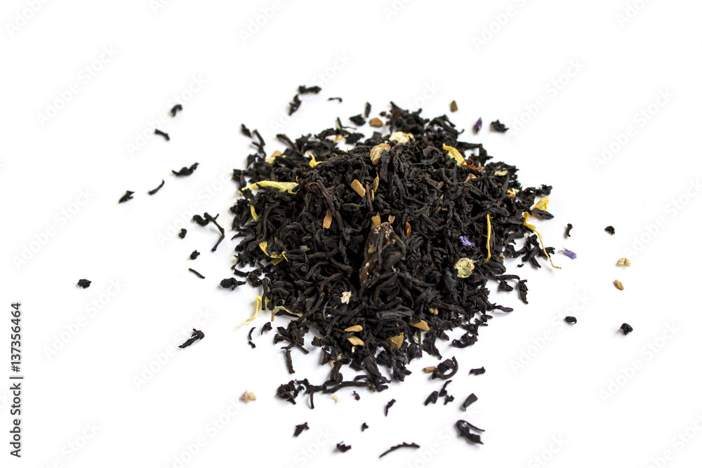 Black tea leaf with flower on white background Black tea leaf with flower on white background