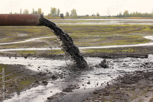 Industrial pipe discharging liquid waste 