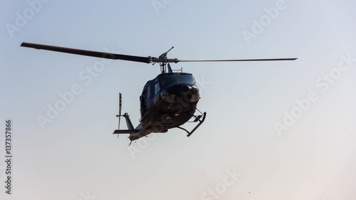 Fototapeta Naklejka Na Ścianę i Meble -  Front view of helicopter in flight.