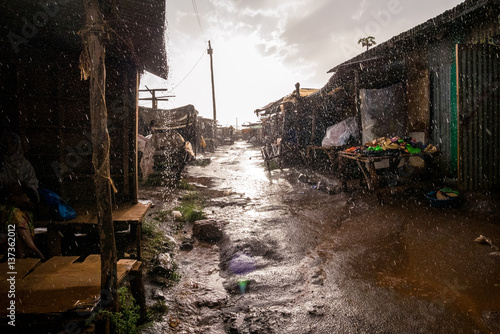 African open air market while raining photo