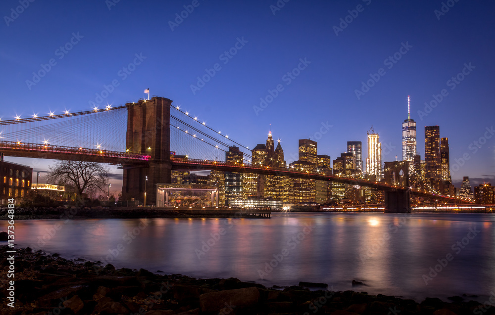 Brooklyn Bridge and Manhattan Skyline at sunset - New York, USA