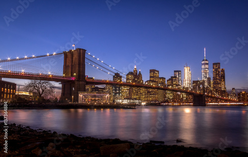 Brooklyn Bridge and Manhattan Skyline at sunset - New York, USA © diegograndi