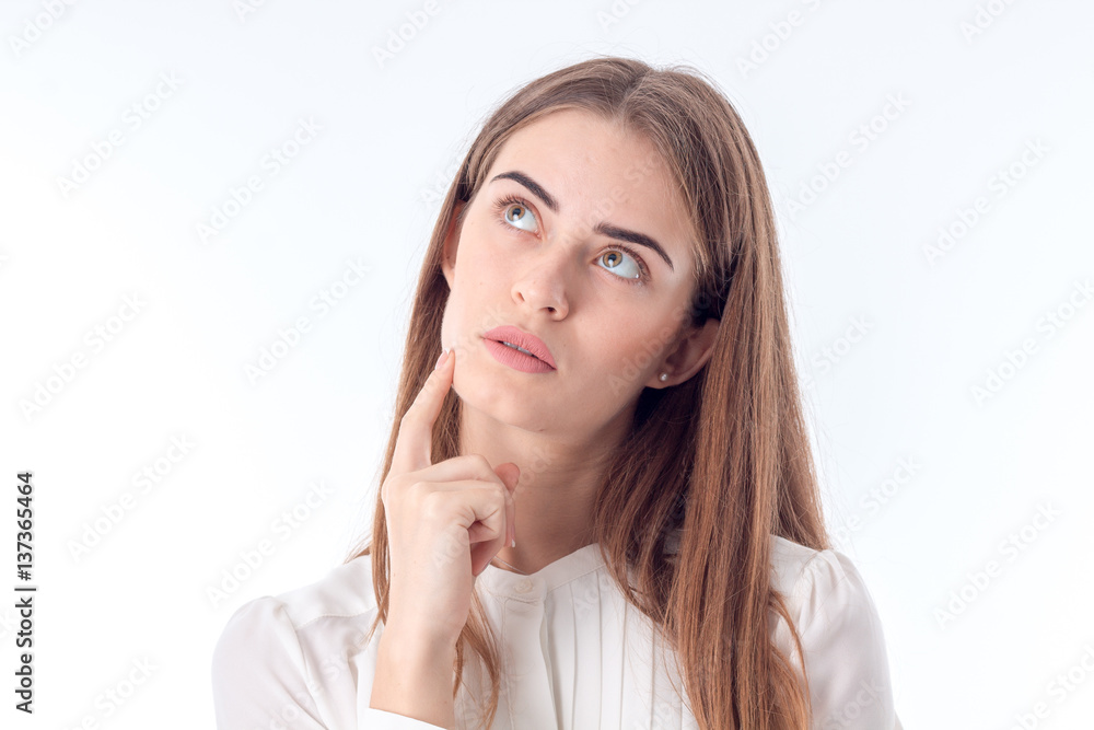 Portrait of a young girl who he looked up isolated on white background Portrait of a young girl who he looked up isolated on white background
